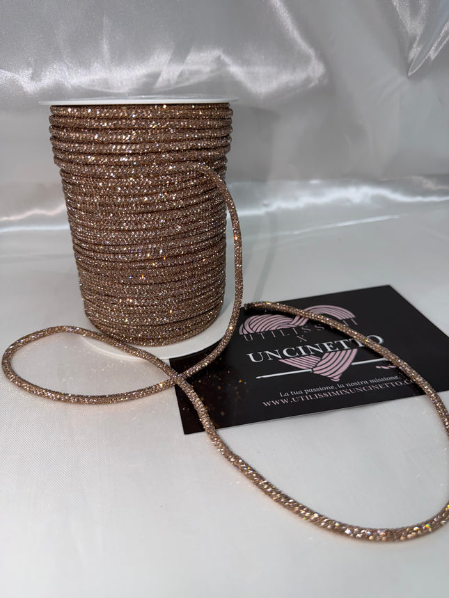 Cordino strass 50 metri oro rosa